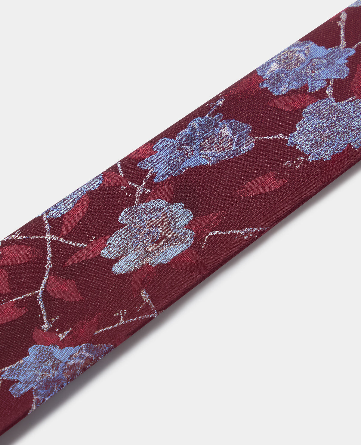 Man wearing a red Floral Foliage Print Tie