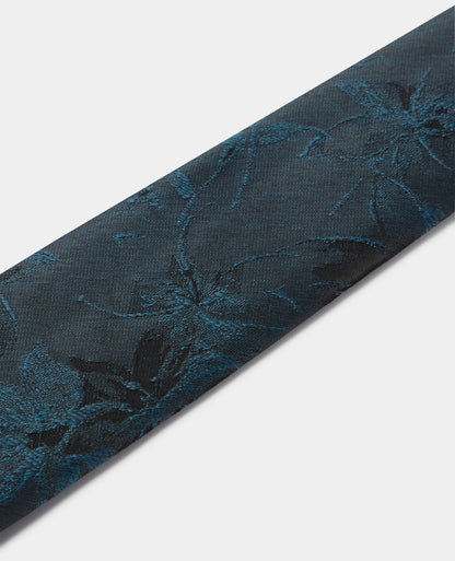 Man wearing a blue Shaded Floral Print Tie