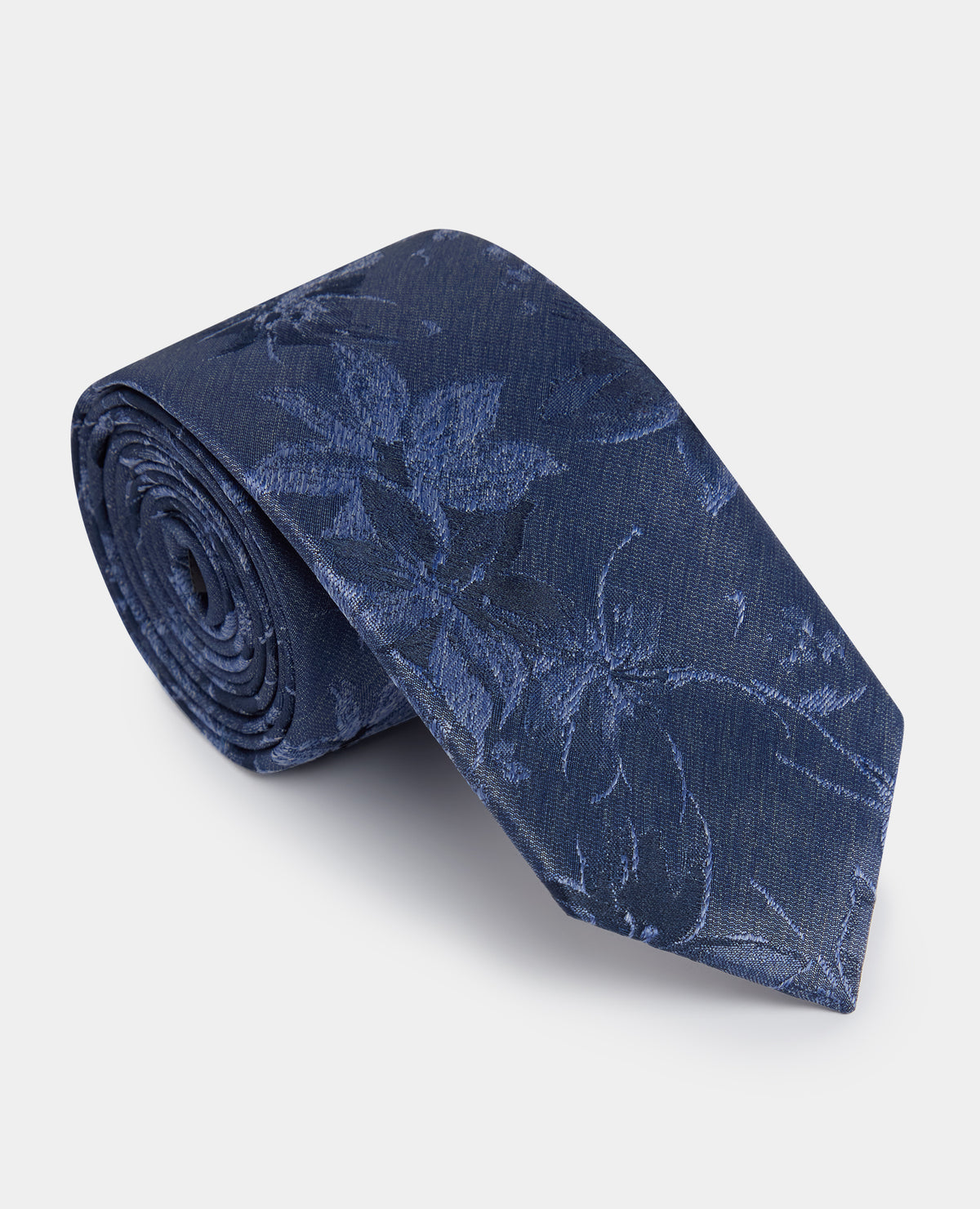 Man wearing a blue Shaded Floral Print Tie