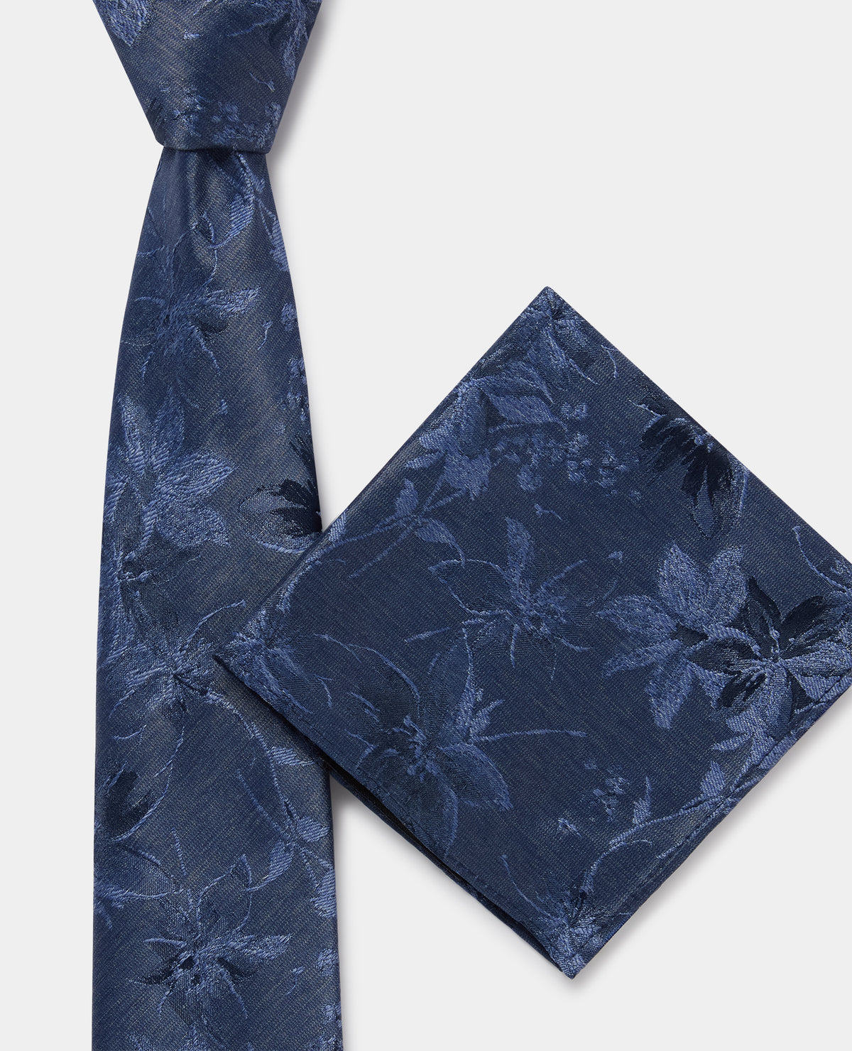 Man wearing a blue Shaded Floral Print Tie