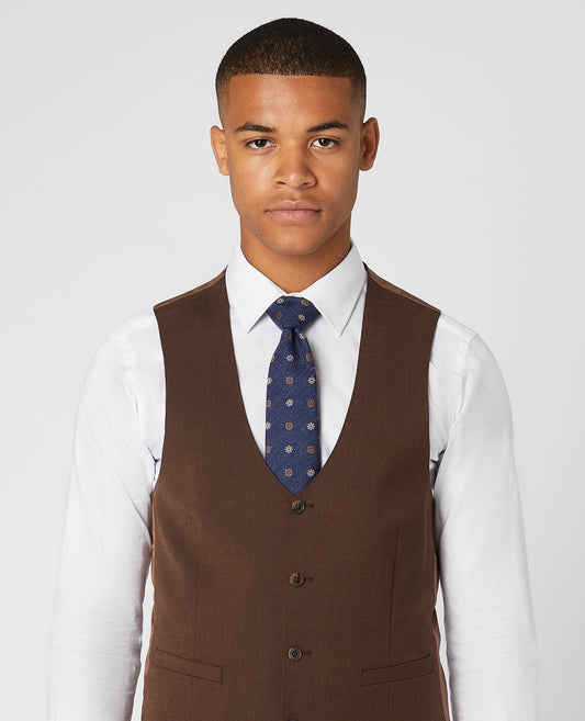 Man wearing a navy Floral Linen-Blend Tie