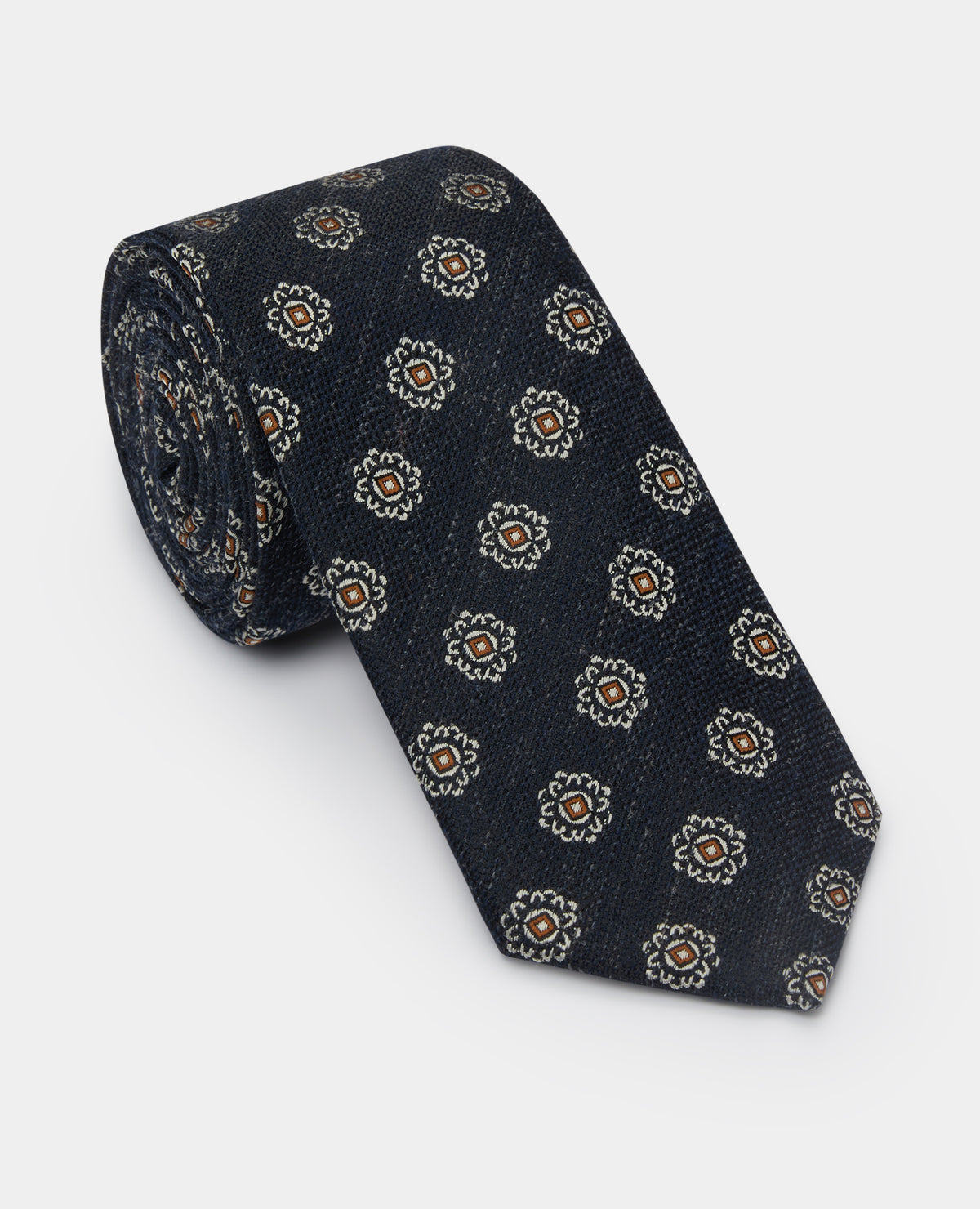 Man wearing a navy Geometric Design Tie