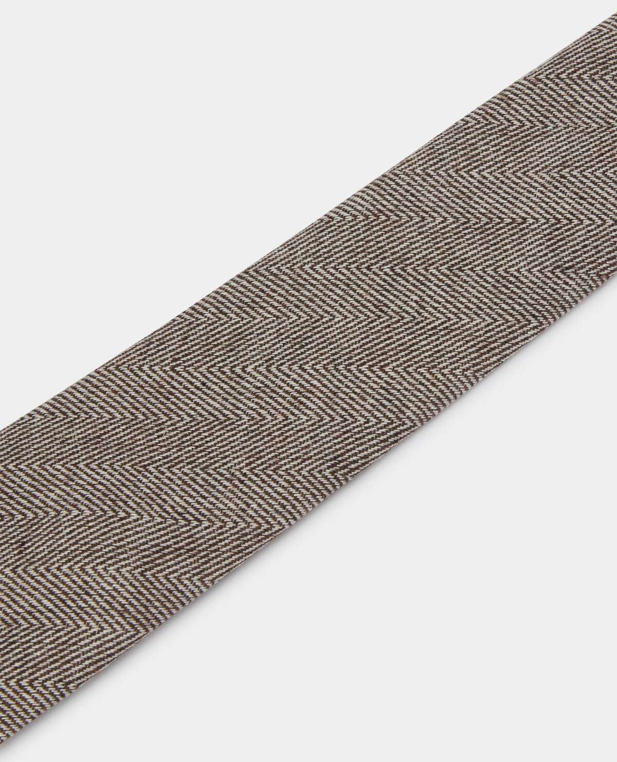 Man wearing a brown Herringbone Design Tie