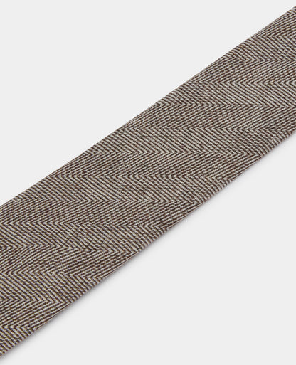 Man wearing a brown Herringbone Design Tie
