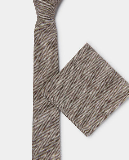 Man wearing a brown Herringbone Design Tie