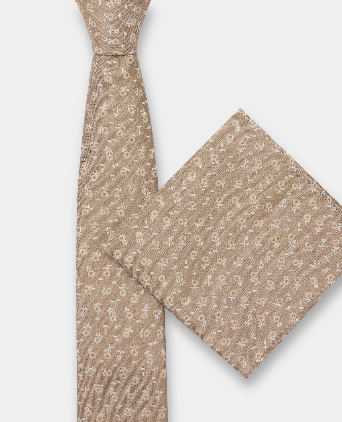 Man wearing a sand Floral Tie