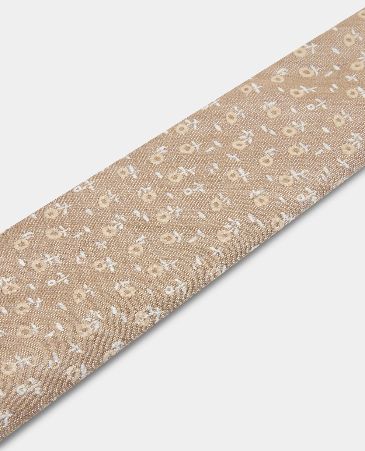 Man wearing a sand Floral Tie