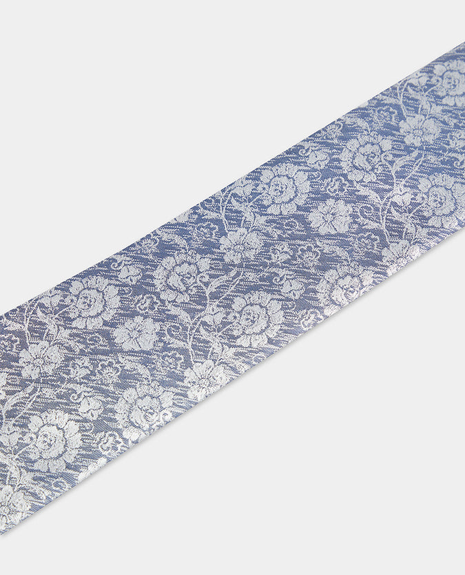 Man wearing a blue Silk Floral Tie