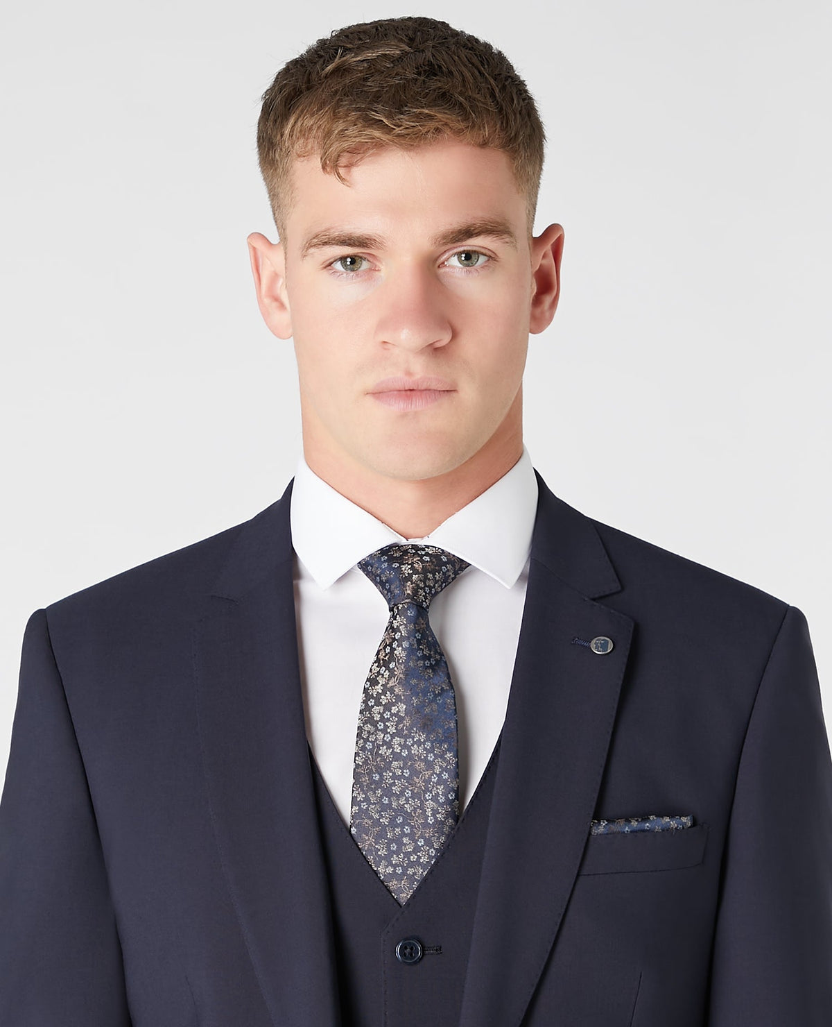Man wearing a navy Silk Floral Tie