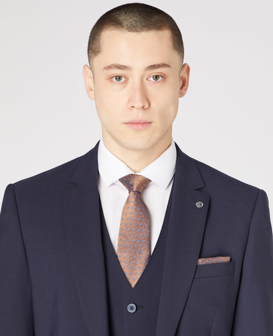 Man wearing a orange Silk Floral Tie