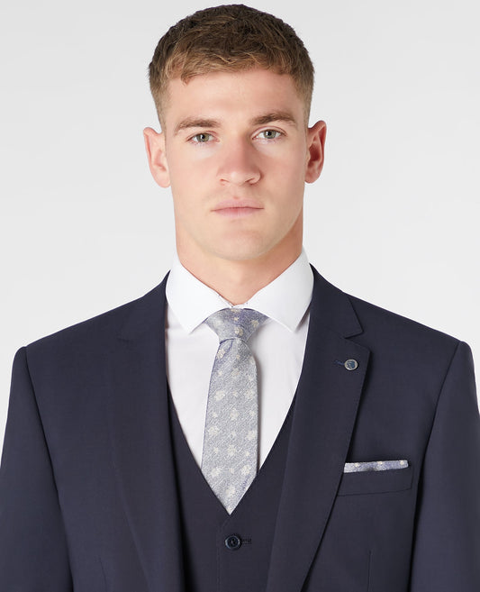 Man wearing a sand Silk Floral Tie