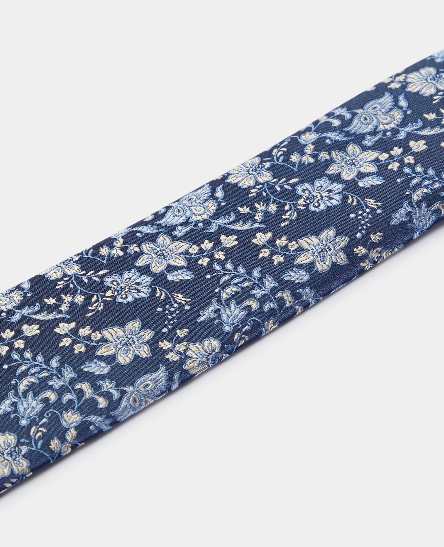 Man wearing a blue Silk Floral Tie