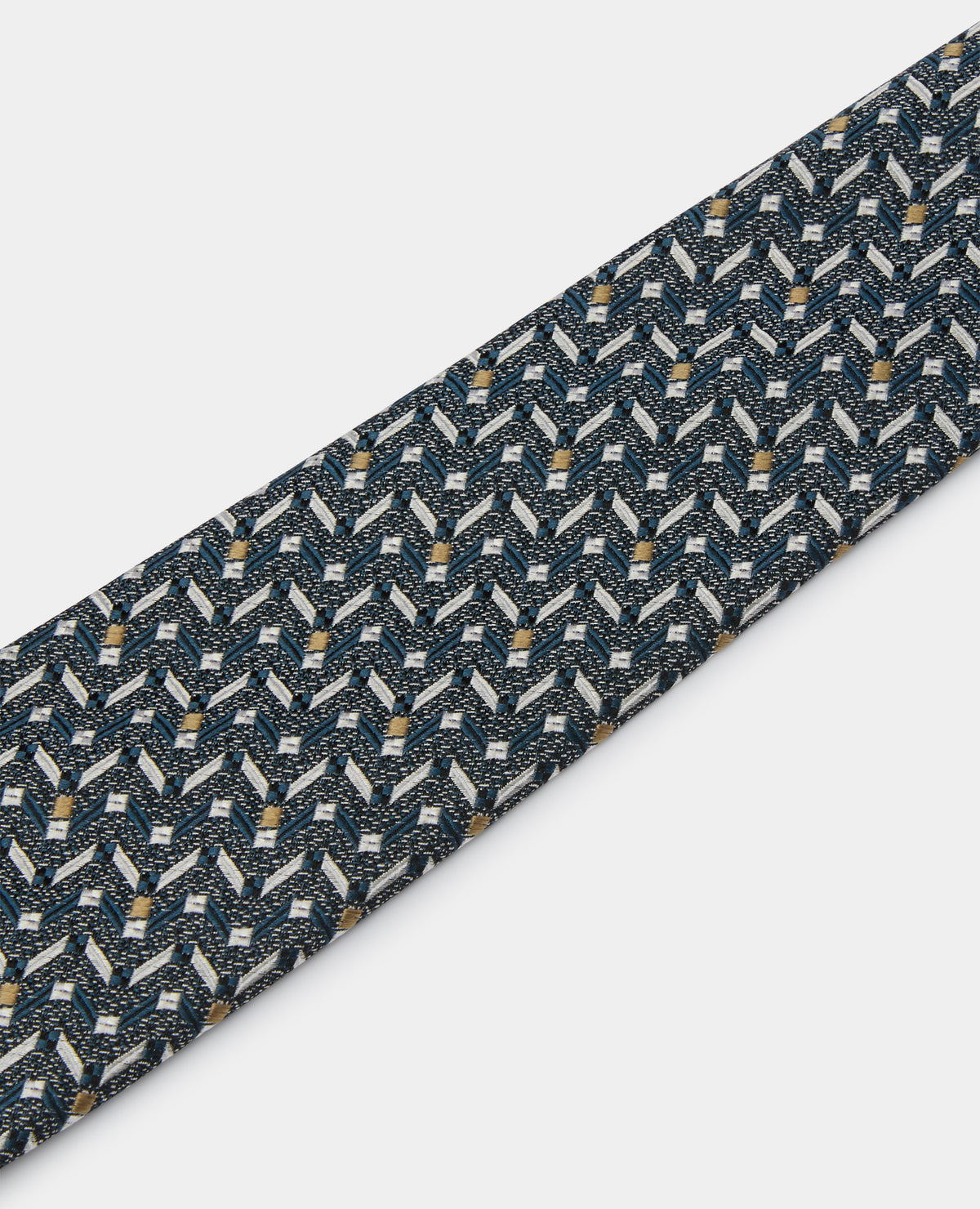 Man wearing a navy Geometric Design Tie
