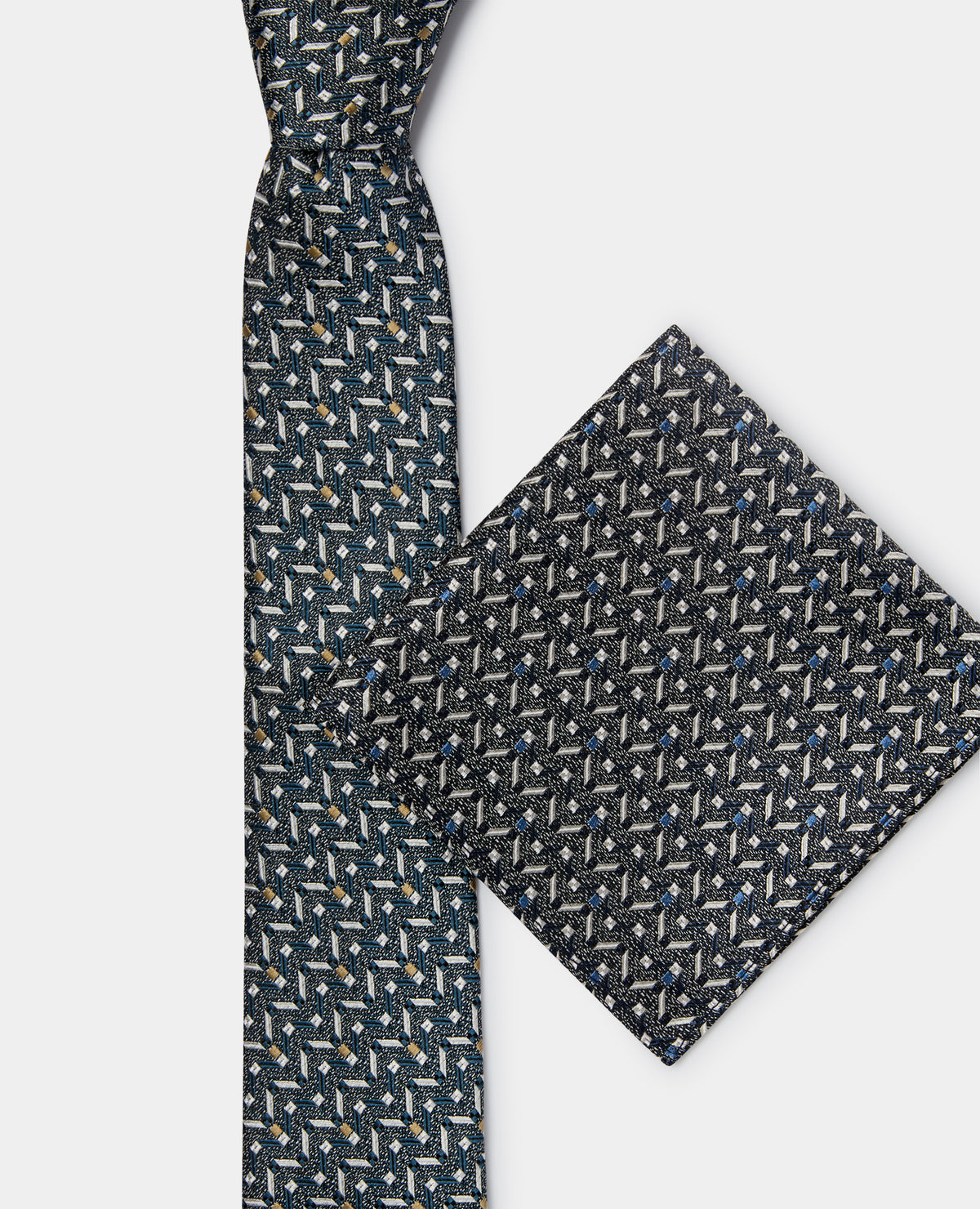 Man wearing a navy Geometric Design Tie