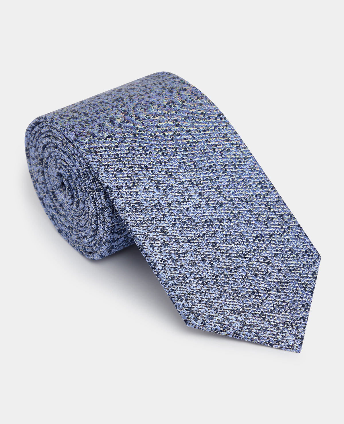 Man wearing a blue Abstract Print Silk Tie
