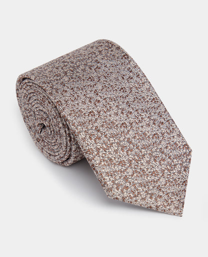 Man wearing a brown Abstract Print Silk Tie