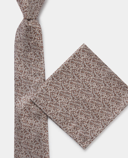 Man wearing a brown Abstract Print Silk Tie