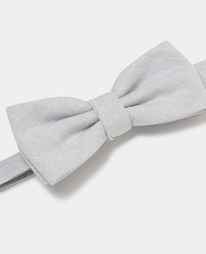Man wearing a blue Linen-Blend Bow Tie