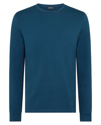 Man wearing a blue Tapered Fit Cotton-Stretch T-Shirt