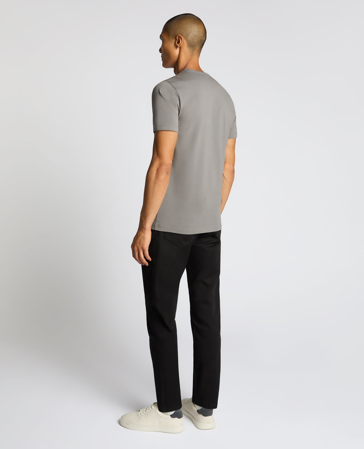 Man wearing a grey Cotton-Stretch Crew Neck T-Shirt