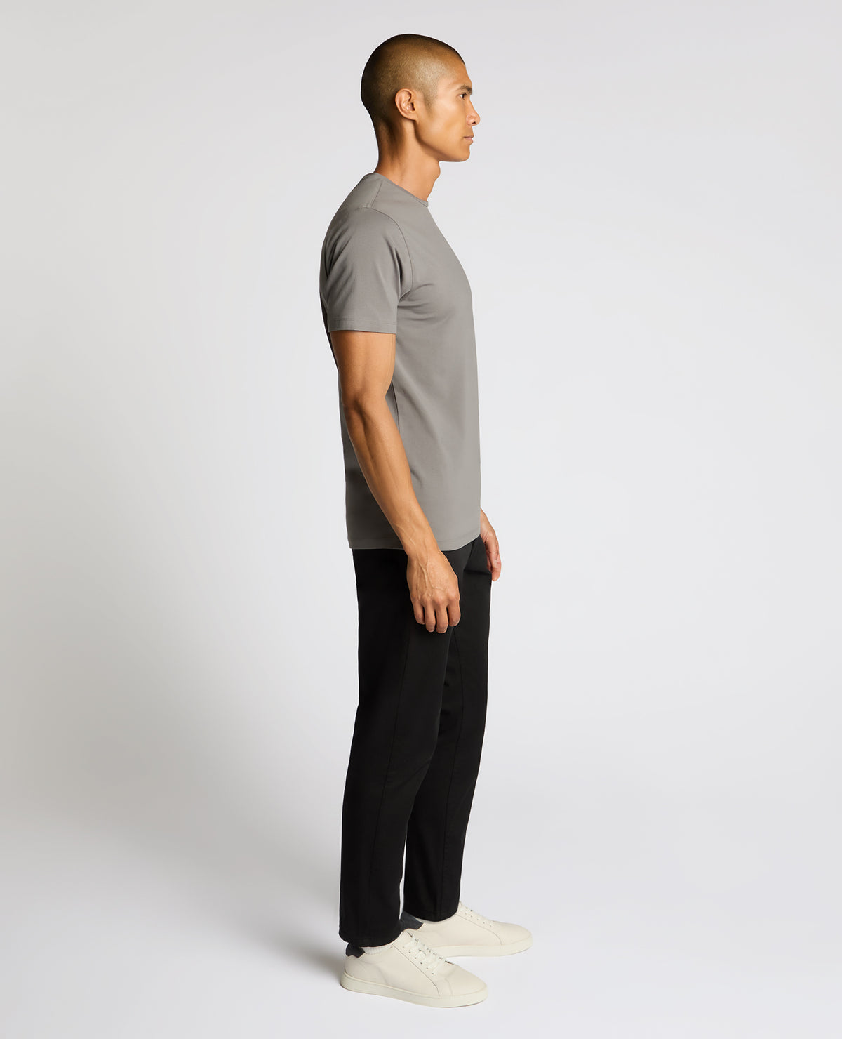 Man wearing a grey Cotton-Stretch Crew Neck T-Shirt