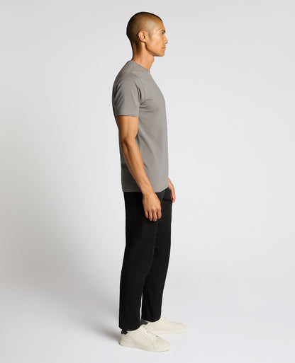 Man wearing a grey Cotton-Stretch Crew Neck T-Shirt
