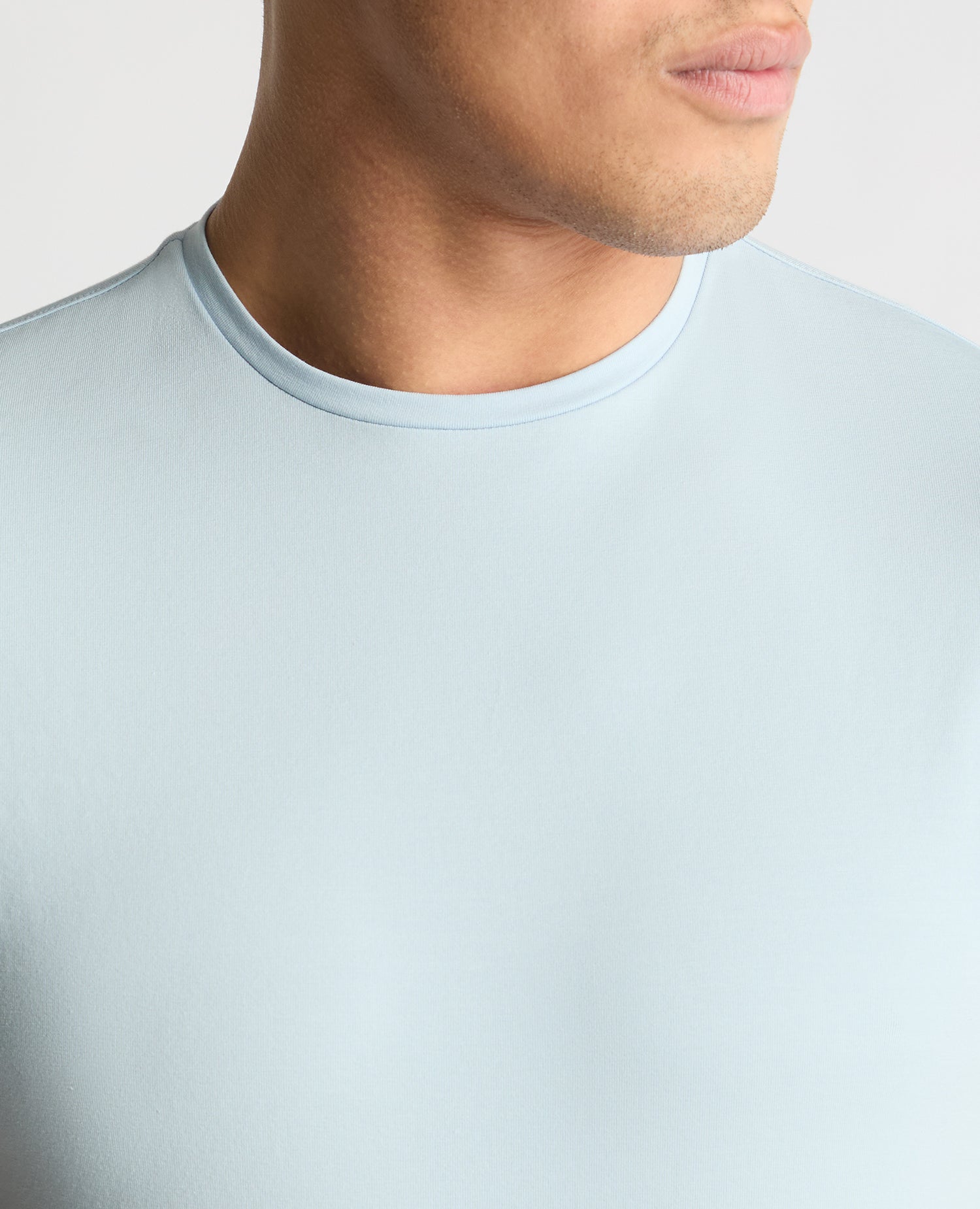 Man wearing a blue t-shirt