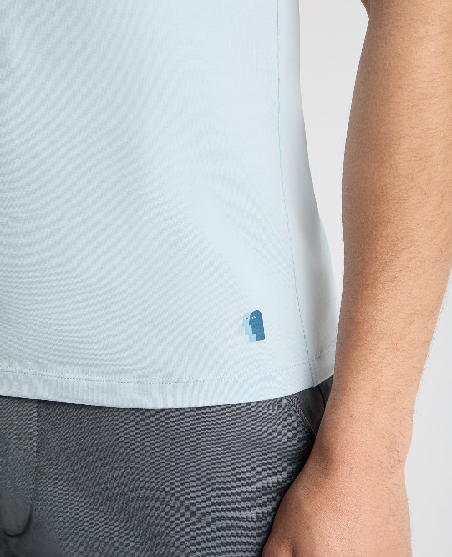 Man wearing a blue t-shirt