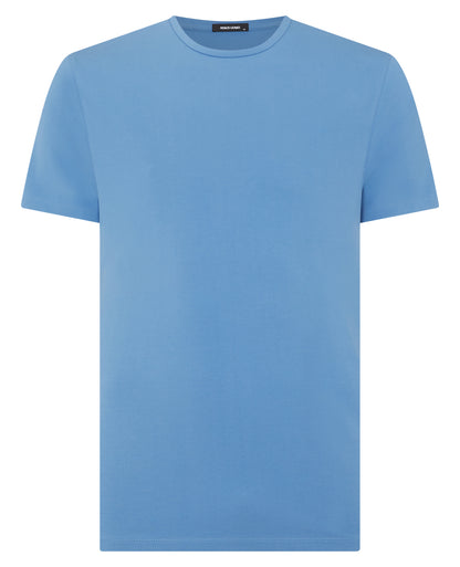 Man wearing a blue Tapered Fit Cotton-Stretch T-Shirt