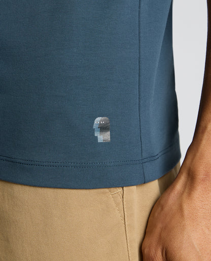 Man wearing a blue Cotton-Stretch Crew Neck T-Shirt