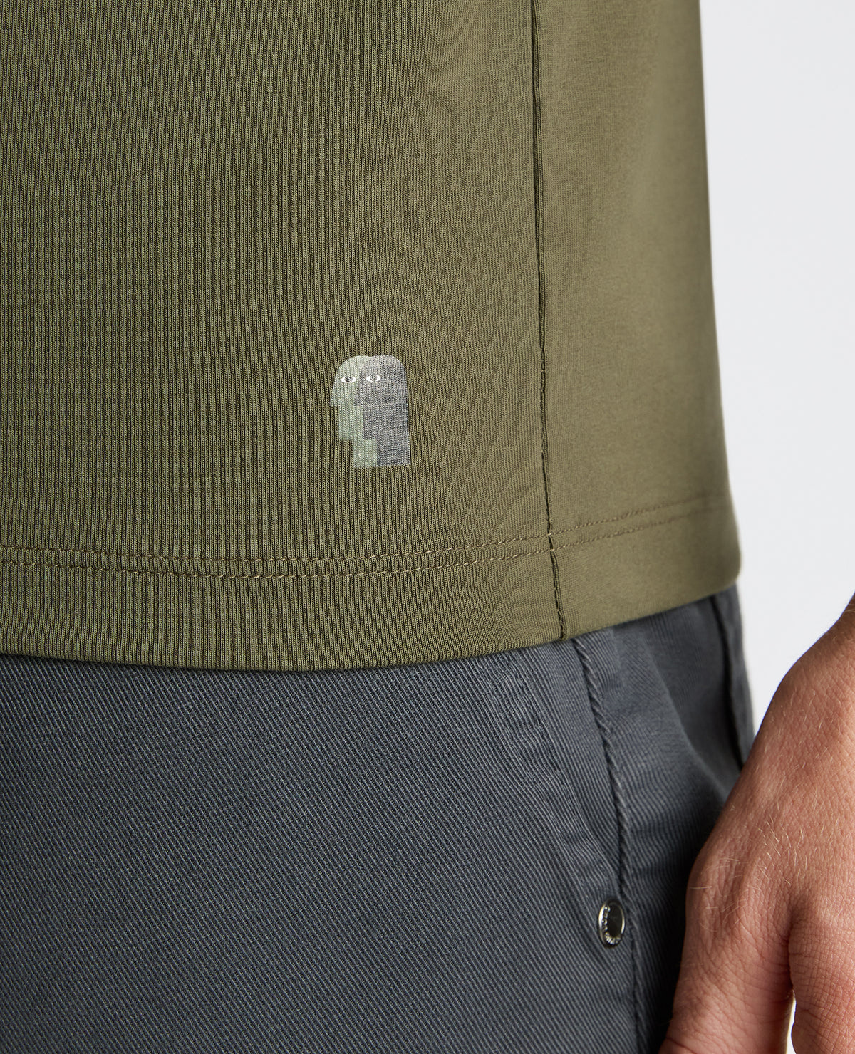 Man wearing a green Cotton-Stretch Crew Neck T-Shirt