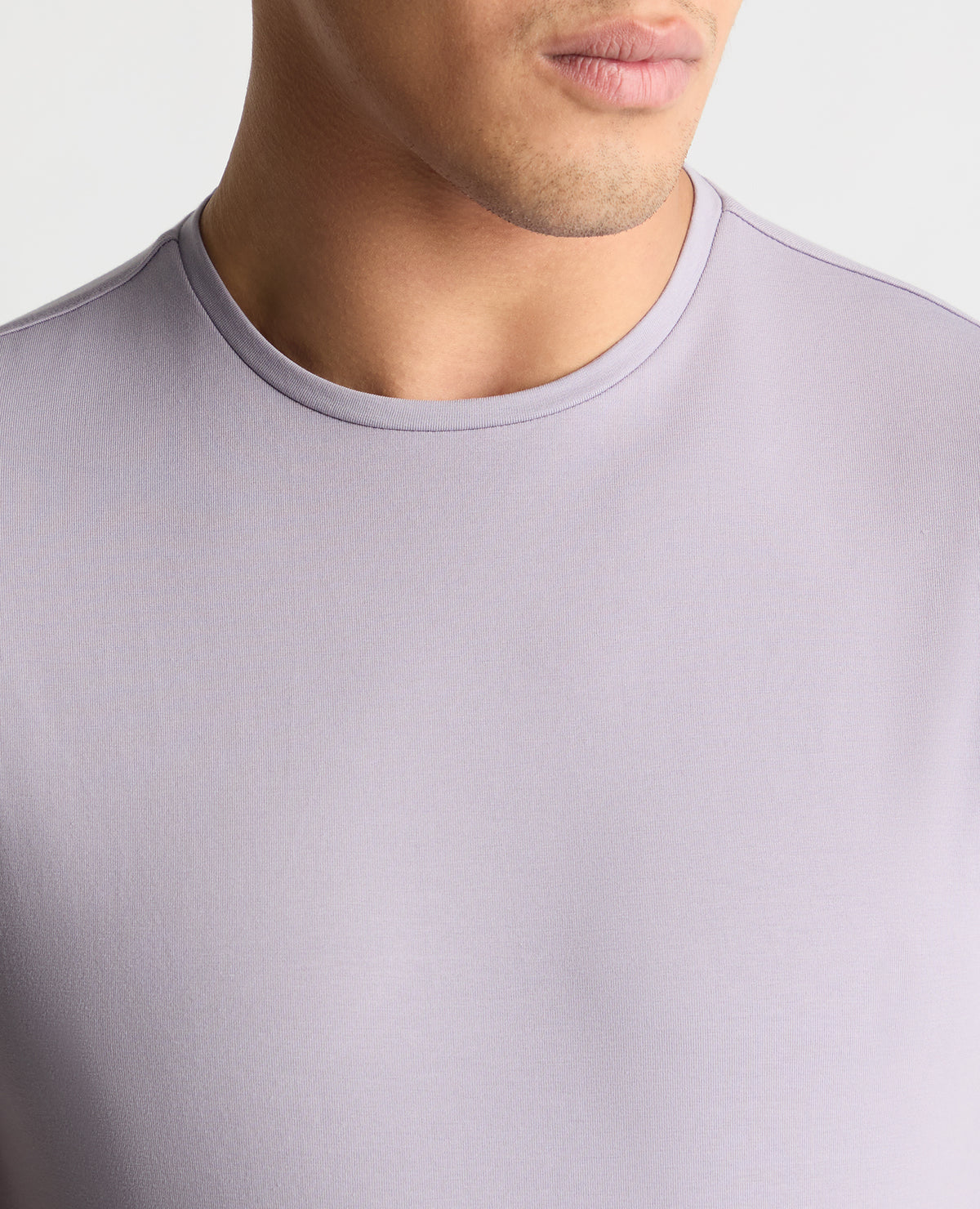 Man wearing a purple  t-shirt