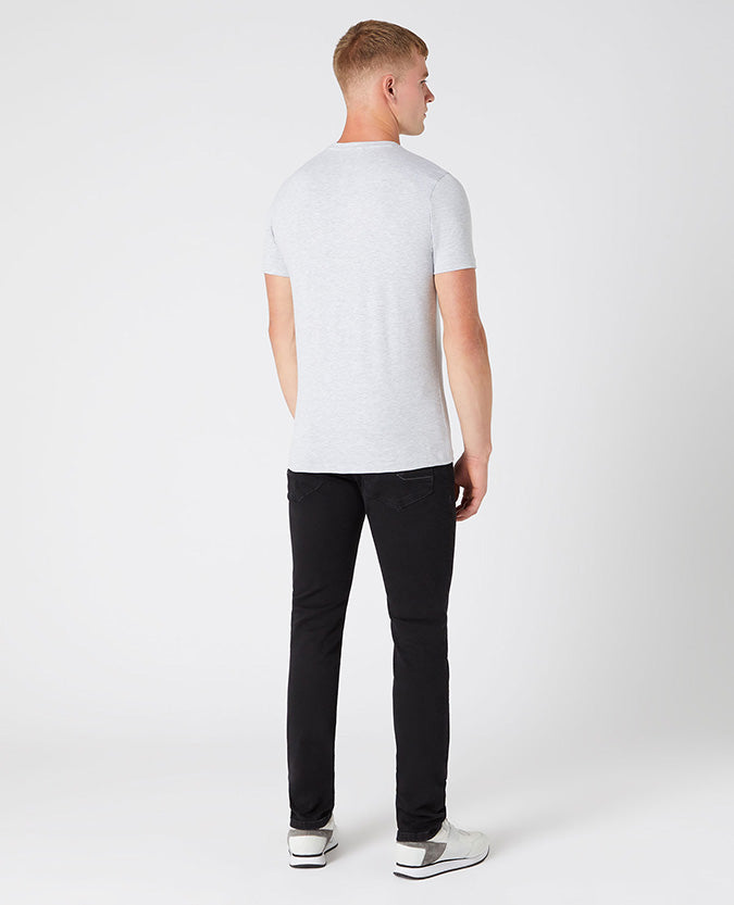 Man wearing a grey Tapered Fit Cotton-Stretch T-Shirt