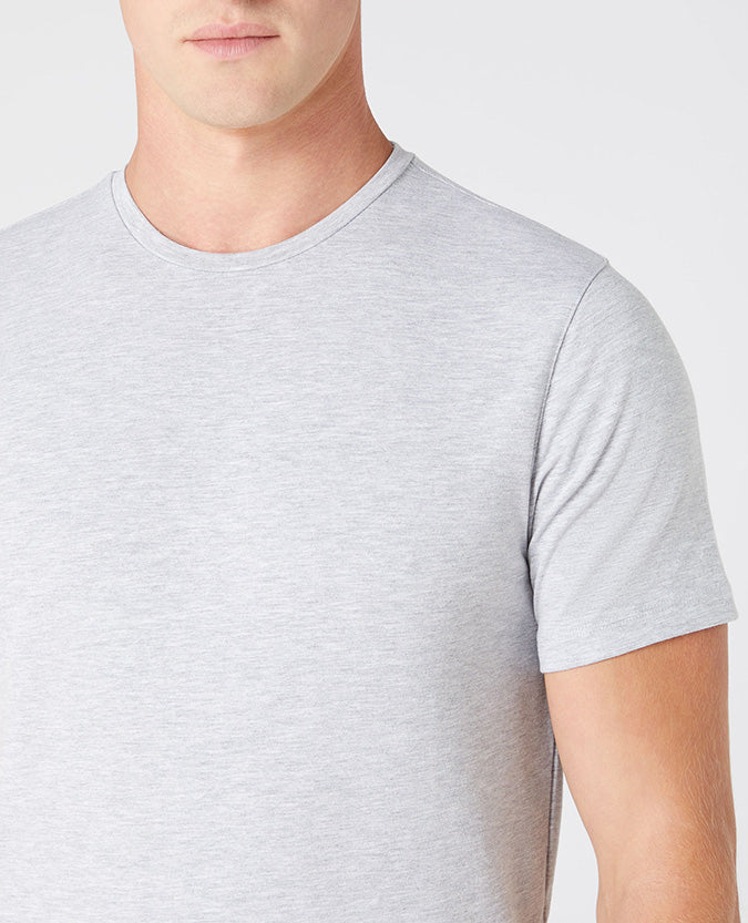 Man wearing a grey Tapered Fit Cotton-Stretch T-Shirt