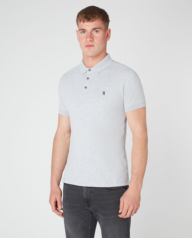 Man wearing a grey Tapered Fit Cotton-Blend Stretch Polo Shirt