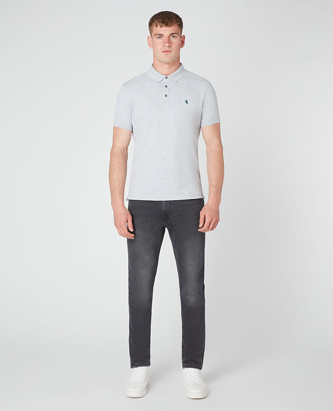 Man wearing a grey Tapered Fit Cotton-Blend Stretch Polo Shirt