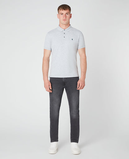 Man wearing a grey Tapered Fit Cotton-Blend Stretch Polo Shirt