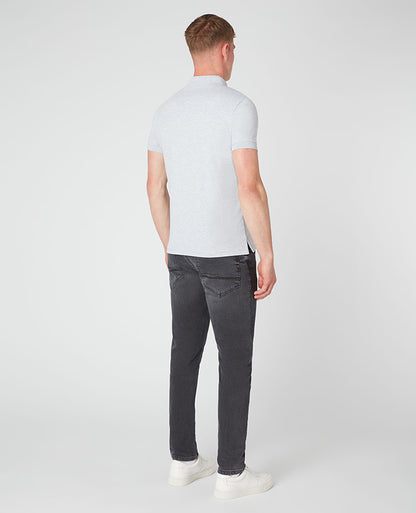 Man wearing a grey Tapered Fit Cotton-Blend Stretch Polo Shirt