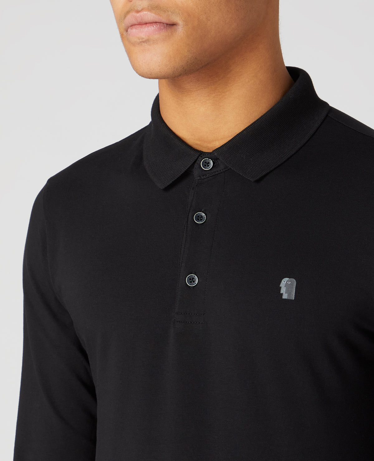 Man wearing a Black polo shirt