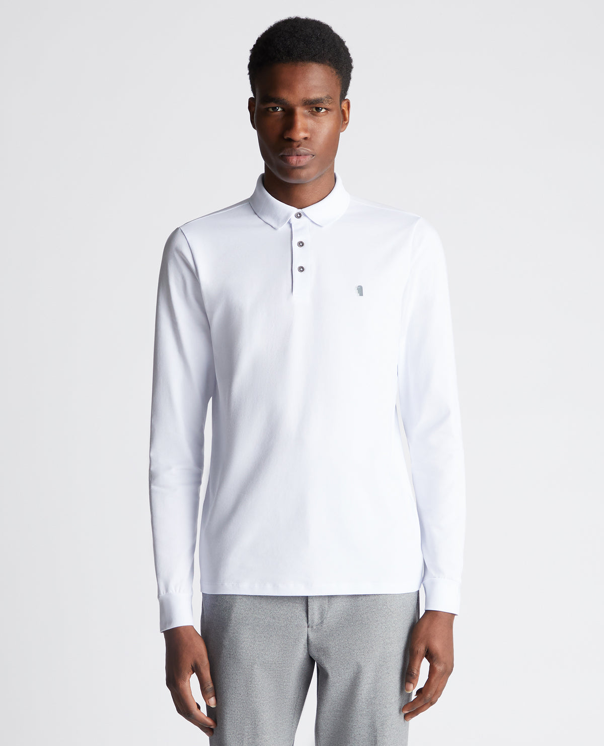 Man wearing a White polo shirt