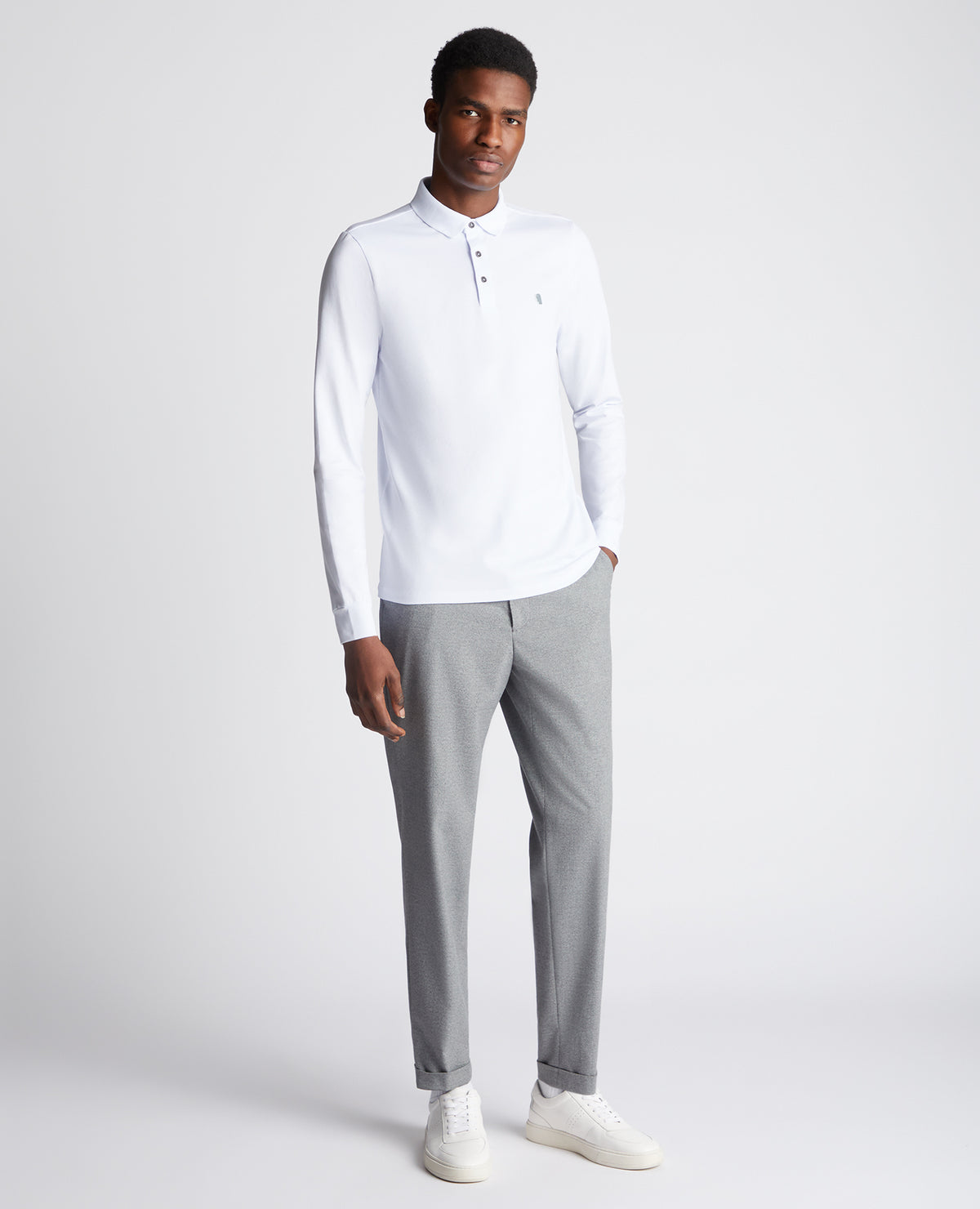 Man wearing a White polo shirt