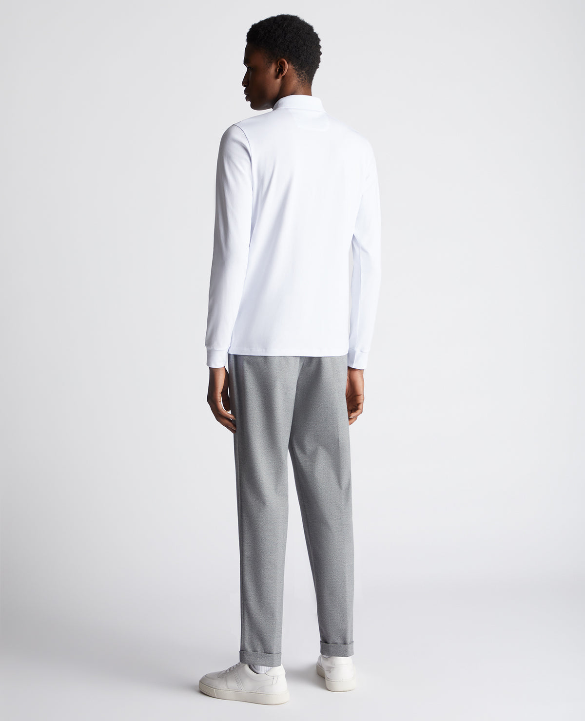 Man wearing a White polo shirt