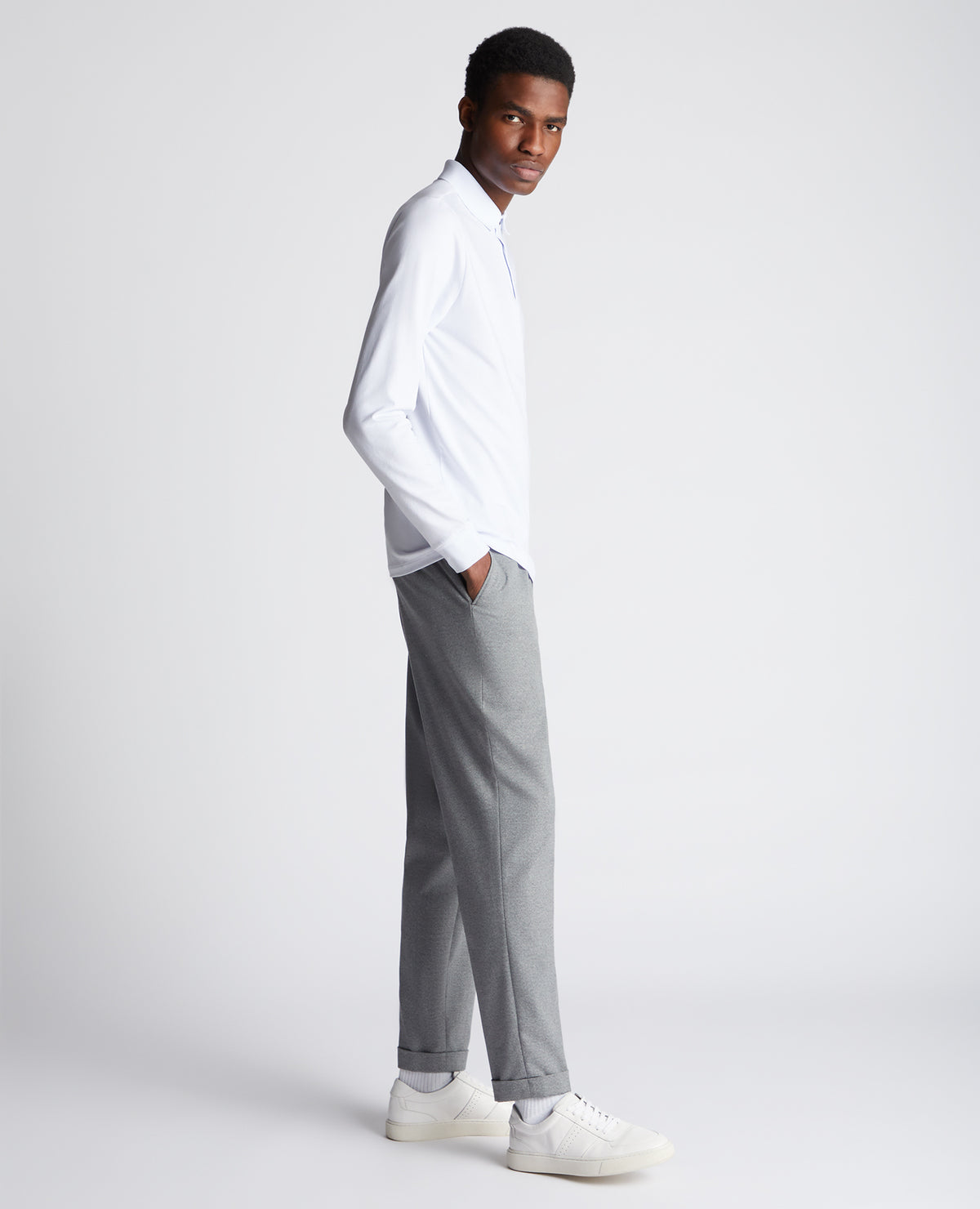 Man wearing a White polo shirt