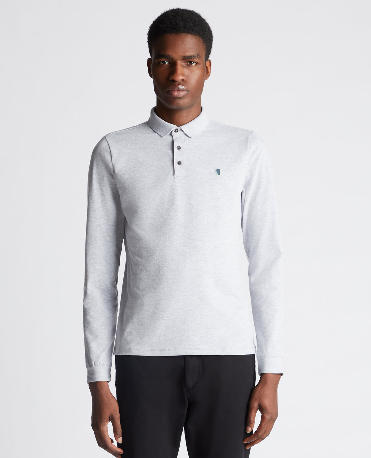 Man wearing a grey Tapered Fit Cotton-Stretch Long-Sleeve Polo Shirt