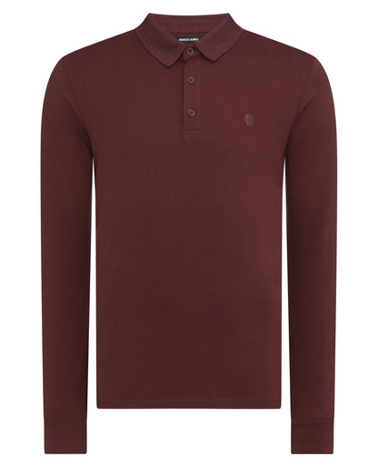 Man wearing a red Tapered Fit Cotton-Stretch Polo Shirt