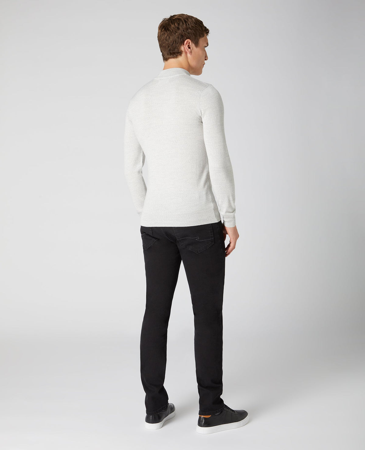 Man wearing a grey Slim Fit Merino Wool-Blend Turtle Neck