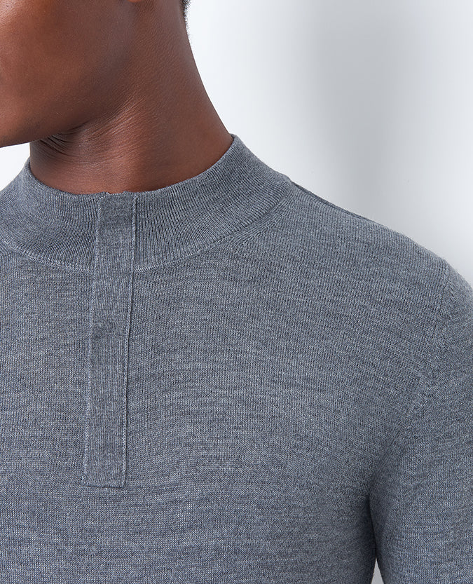 Man wearing a grey Slim Fit Merino Wool-Blend Half-Zip Sweater
