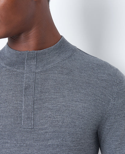 Man wearing a grey Slim Fit Merino Wool-Blend Half-Zip Sweater