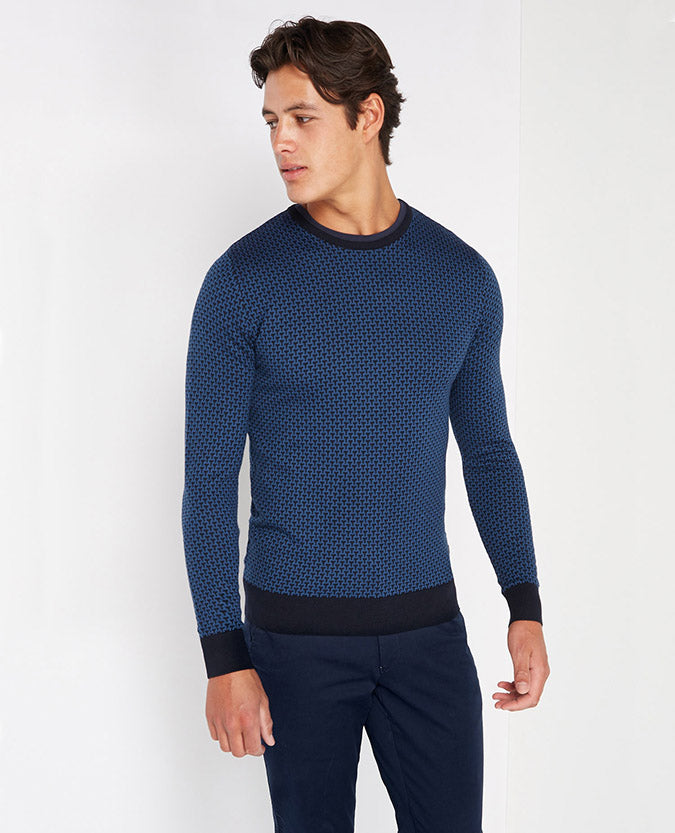 Man wearing a navy Slim Fit Merino Wool-Blend Crew Neck Sweater