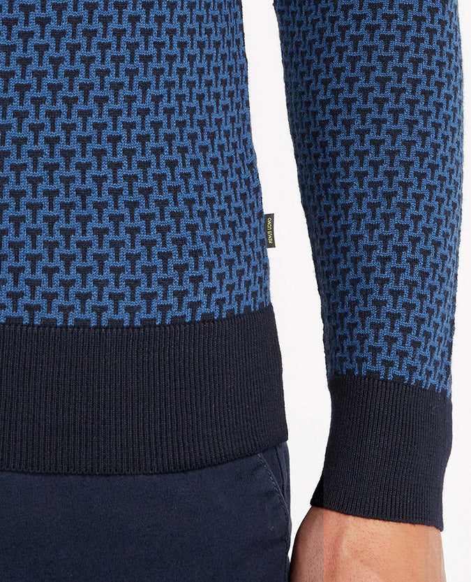 Man wearing a navy Slim Fit Merino Wool-Blend Crew Neck Sweater